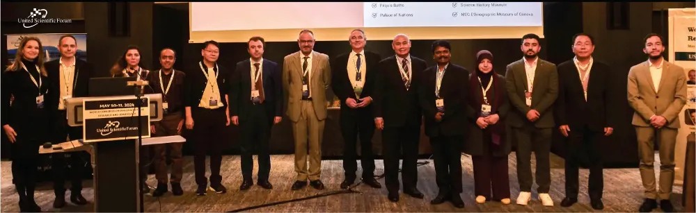 Group photograph of keynote speakers, conference organizers, and international delegates during the opening ceremony of a global scientific conference.